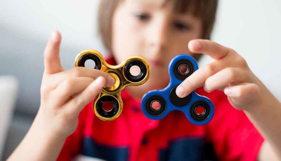 Boy playing with fidget toy