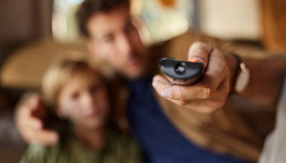 Father and son watching tv
