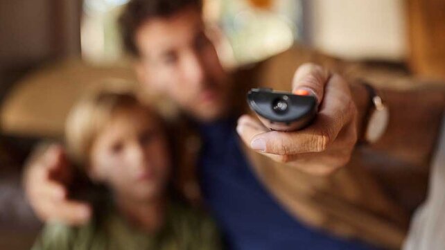 Father and son watching tv