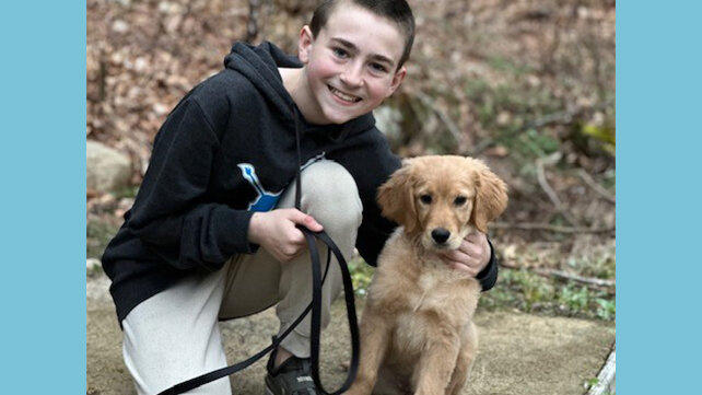 Grateful Patient AJ with his puppy